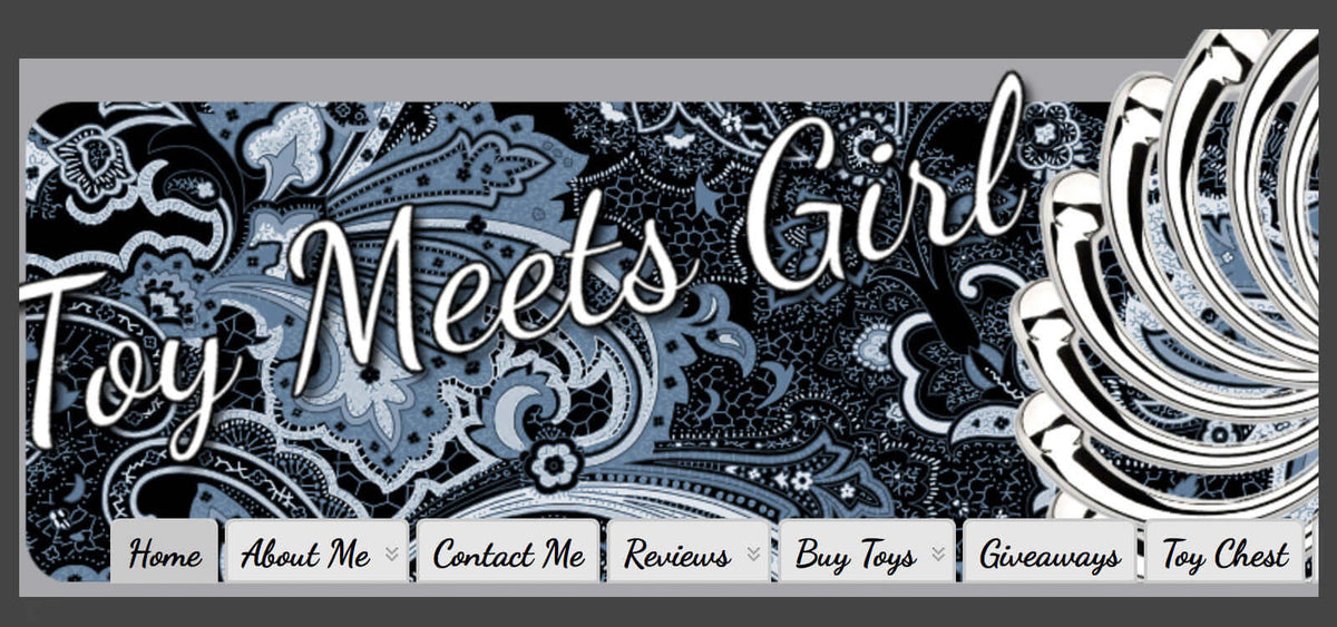 Toy Meets Girl website banner with decorative black and white paisley background and navigation menu options.