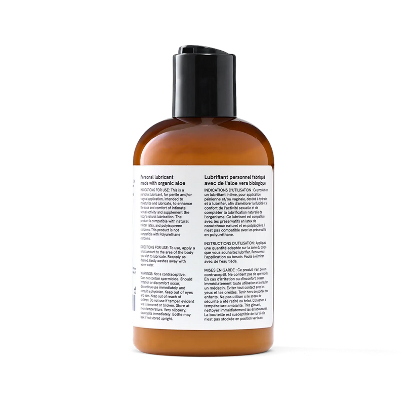 Penchant organic aloe based personal lubricant bottle back label with bilingual ingredients and usage instructions, transparent background